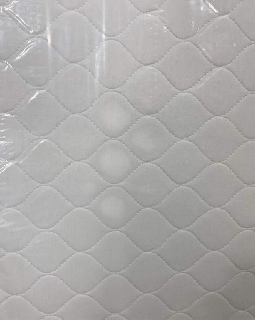 Babyletto Pure Core Non-Toxic Crib Mattress With Hybrid Waterproof Cover - Image 4